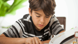 A boy reading a book